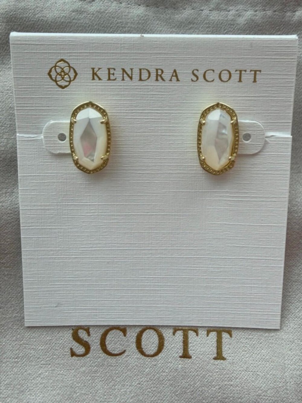 Kendra Scott white earrings